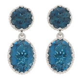 Oval blue London Topaz sterling silver earrings with accent for elegant style and luxury.